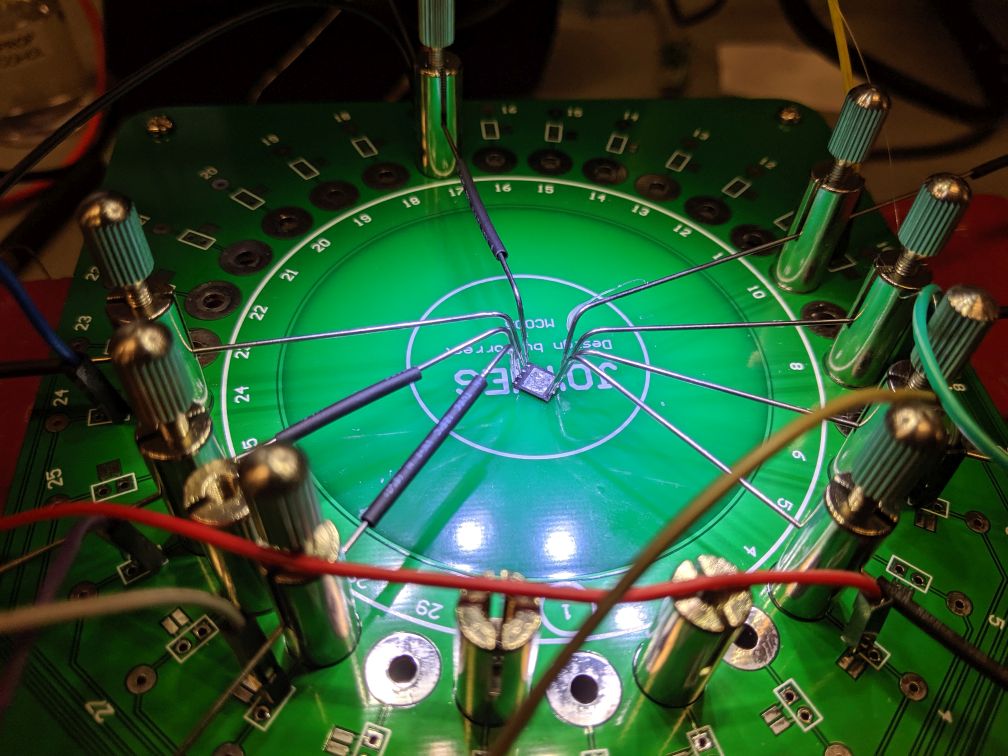 using needles to connect to SPI flash chip - closeup